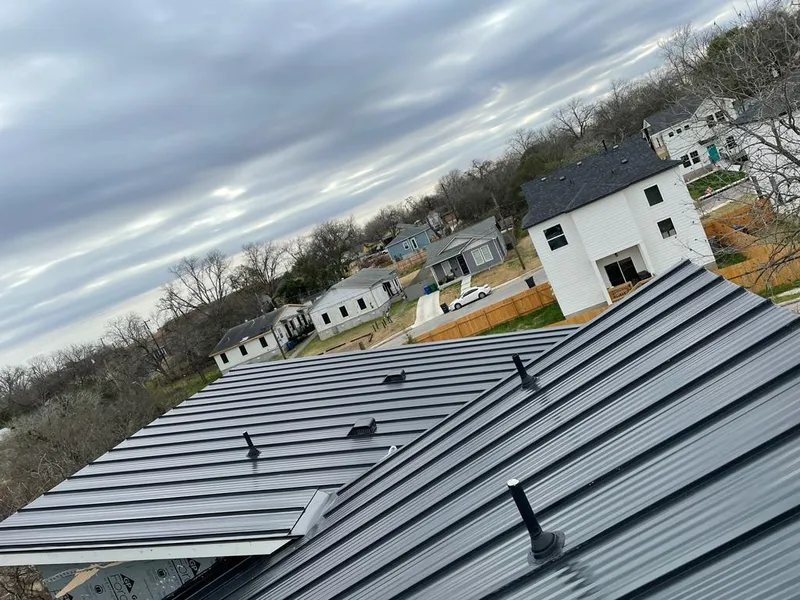 Standing seam metal roof panels with vents for Skylight Repair in Center Point